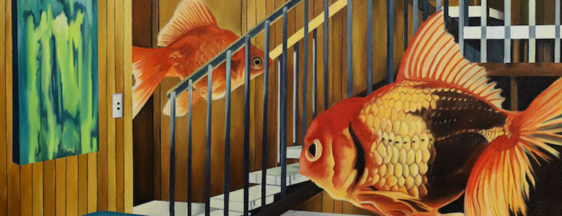 Home interior with staircase and goldfish floating in air.
